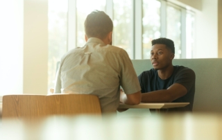 two men talking