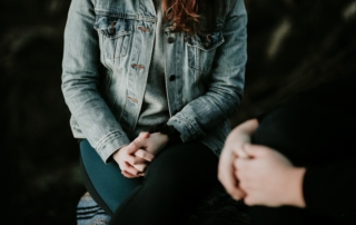 woman wearing gray jacket